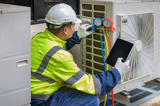 Professional Heat Pump Repair technician working in Atalissa, IA